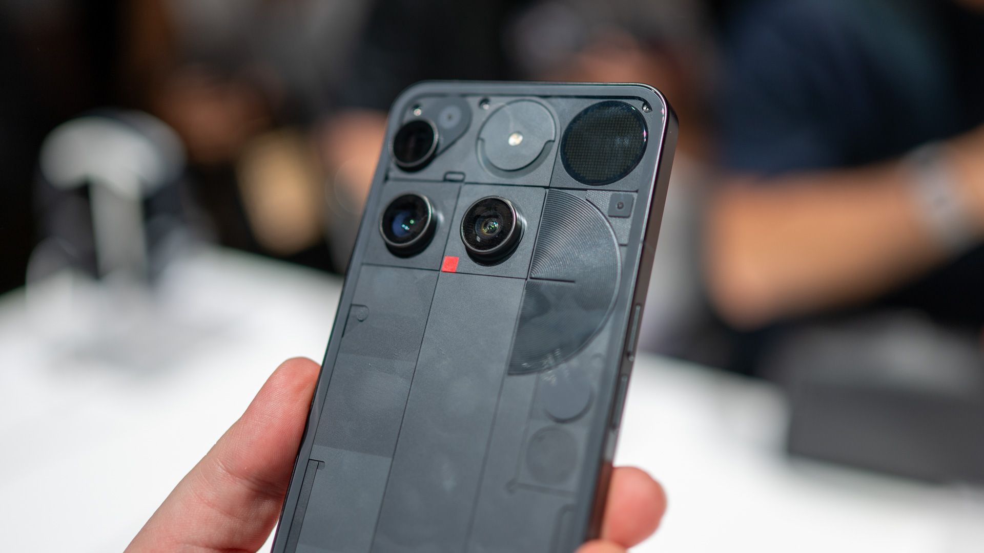 The back of the Nothing Phone 3 with various cameras.