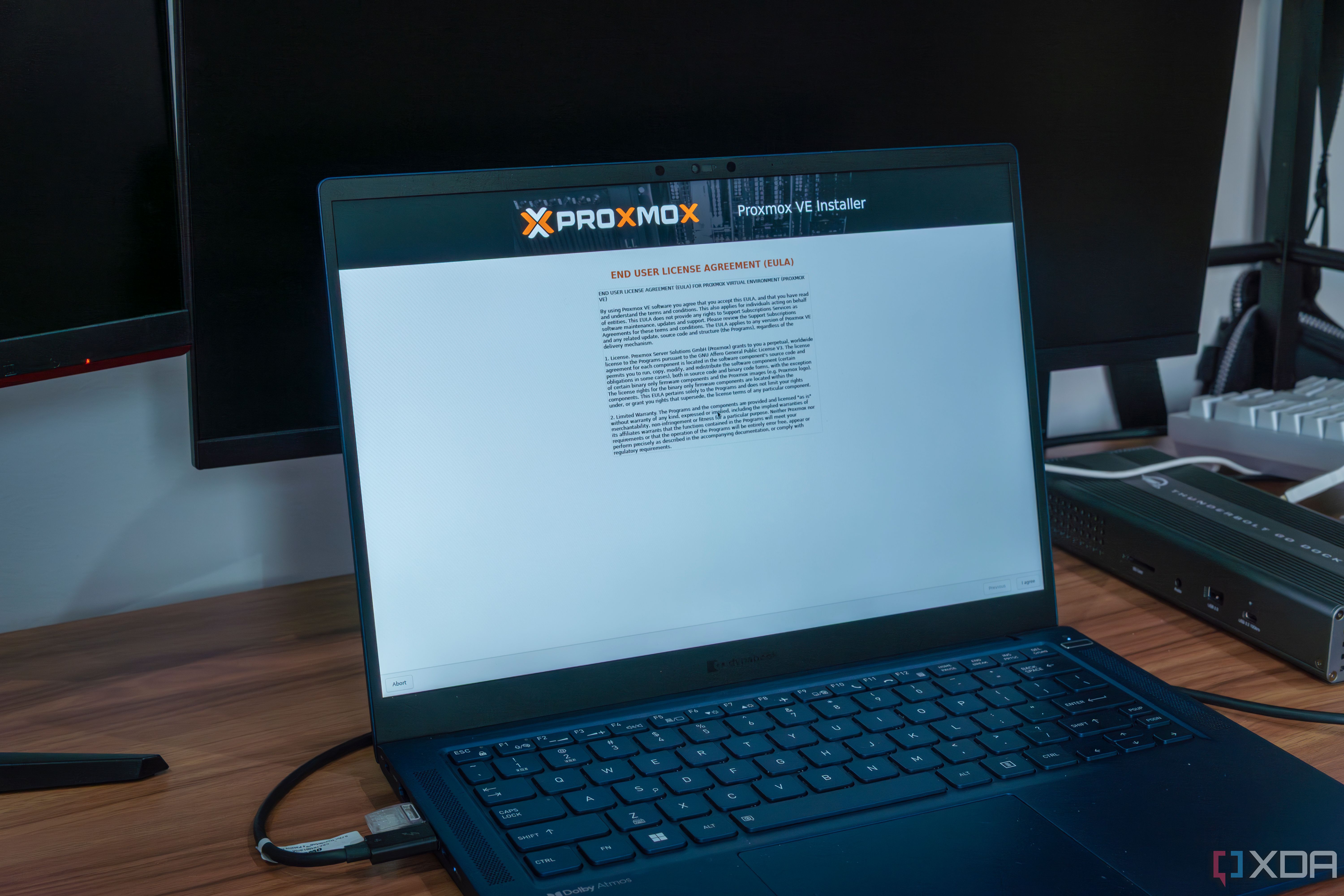 A laptop running the Proxmox setup process
