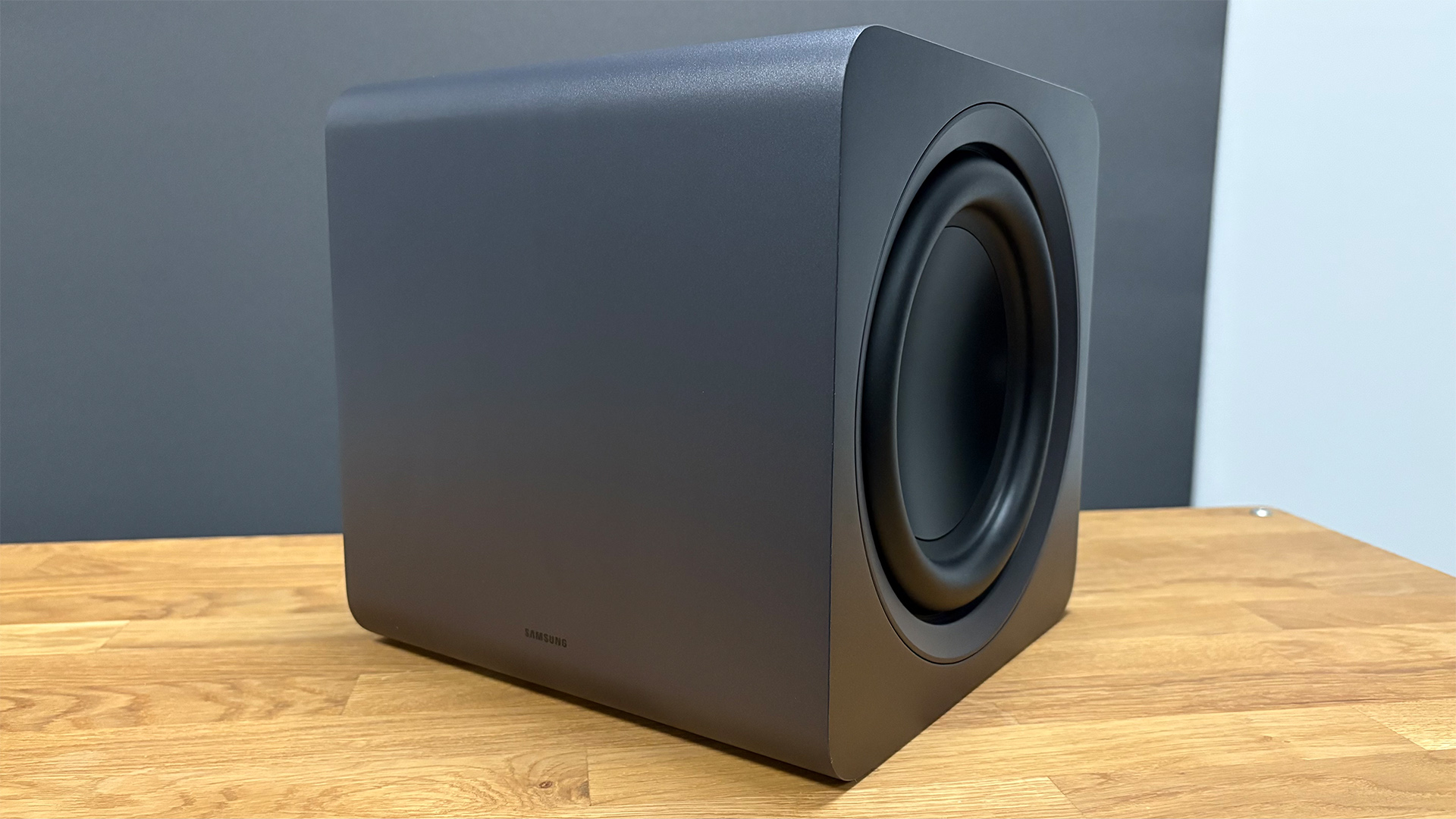 Samsung HW-Q990F soundbar package subwoofer on wooden surface
