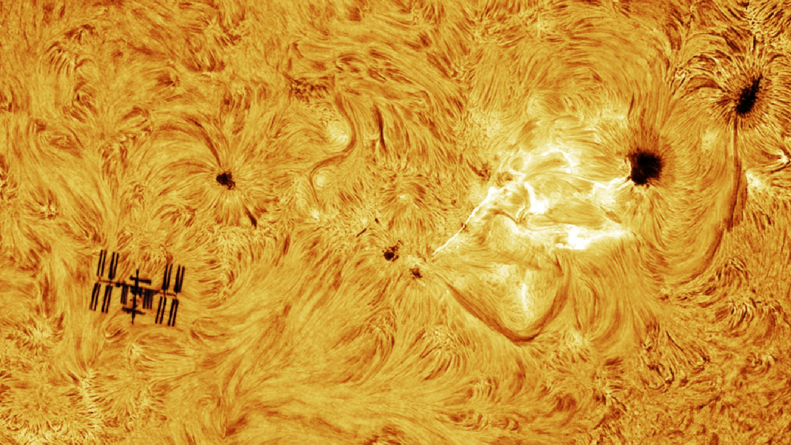 Astrophotographer snaps ‘once-in-a-lifetime’ shot of solar flare photobombing the ISS