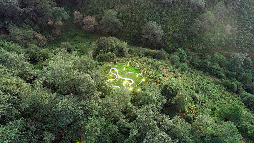 slender steel arcs blossom into kong xiangwei studio's camellia-like theater in china