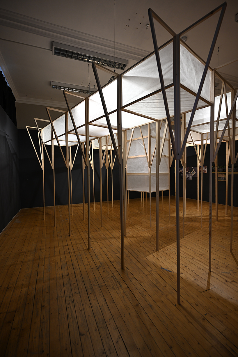ryo yamada's site-specific timber installation visualizes future sea level at summerhall arts