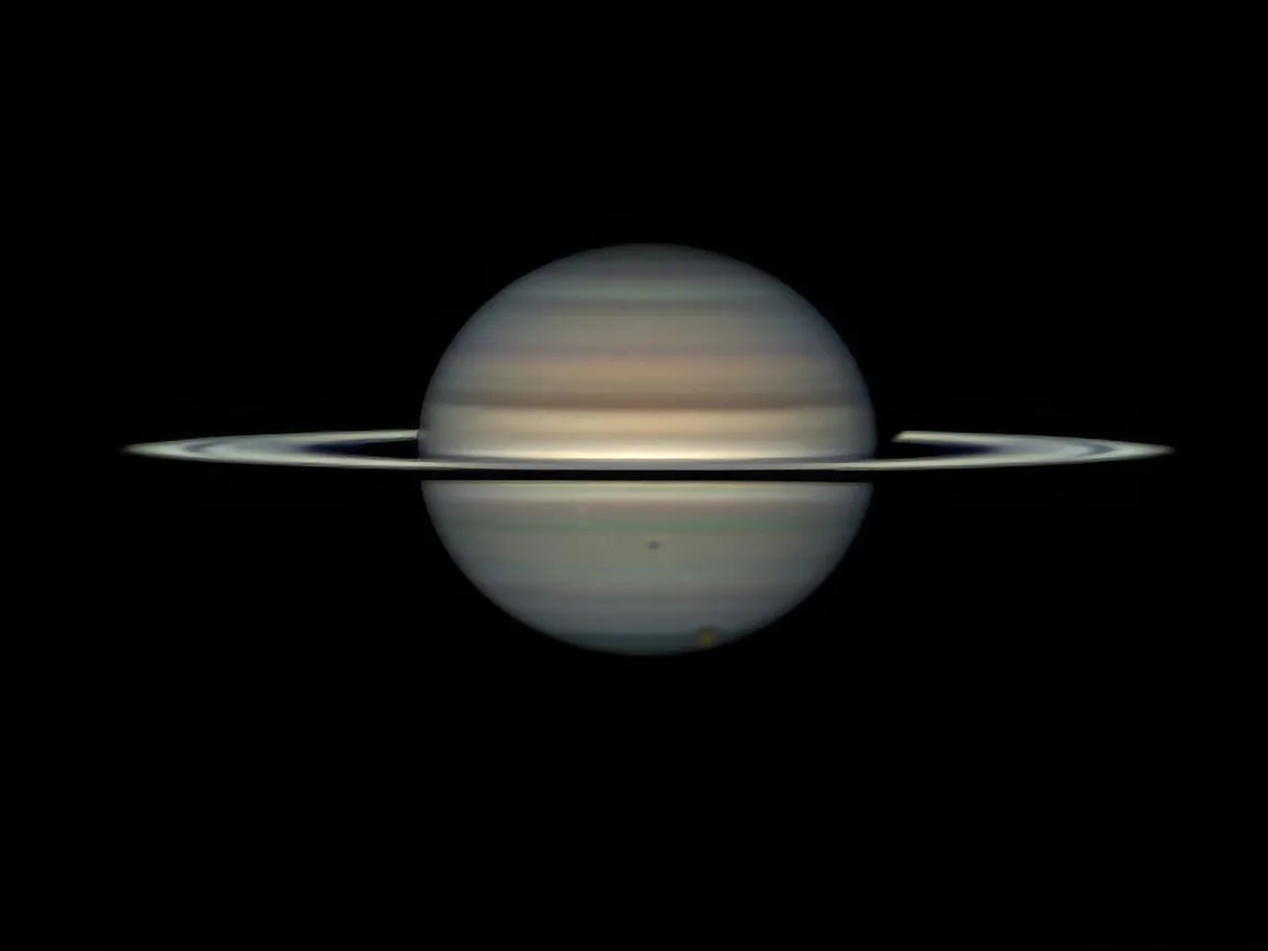 Titan transit of Saturn Eric Sussenbach, Willemstad, Curaçao, 1 August 2024 Equipment: Player One Neptune 664C camera, Celestron EdgeHD 14-inch Schmidt-Cassegrain, iOptron CEM120 mount