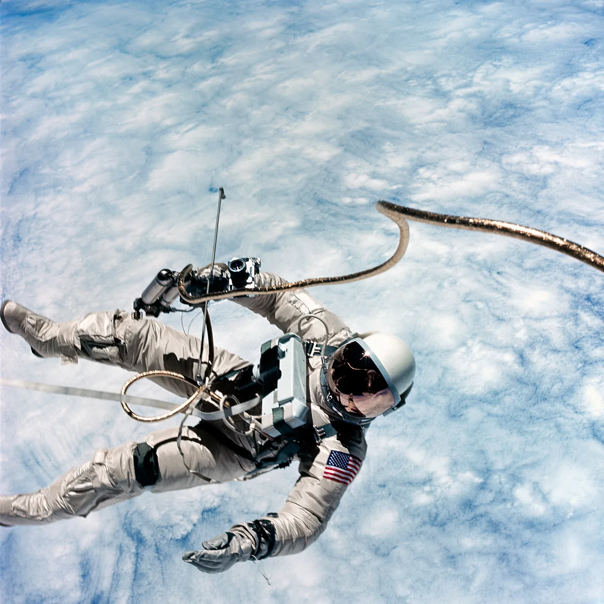 Ed White floats in the void during the first U.S. spacewalk on Gemini 4, 3rd June, 1965. White is also featured on the cover of the book. Credit NASA / ASU / Andy Saunders