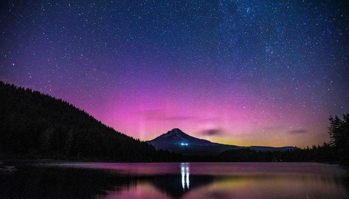 To view the dazzling sky in colours, go out to an open place away from city lights and look toward the northern side of the sky.