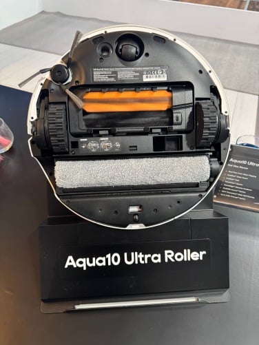 Brush roll and roller mop on underside of Dreame Aqua10 Roller robot vacuum