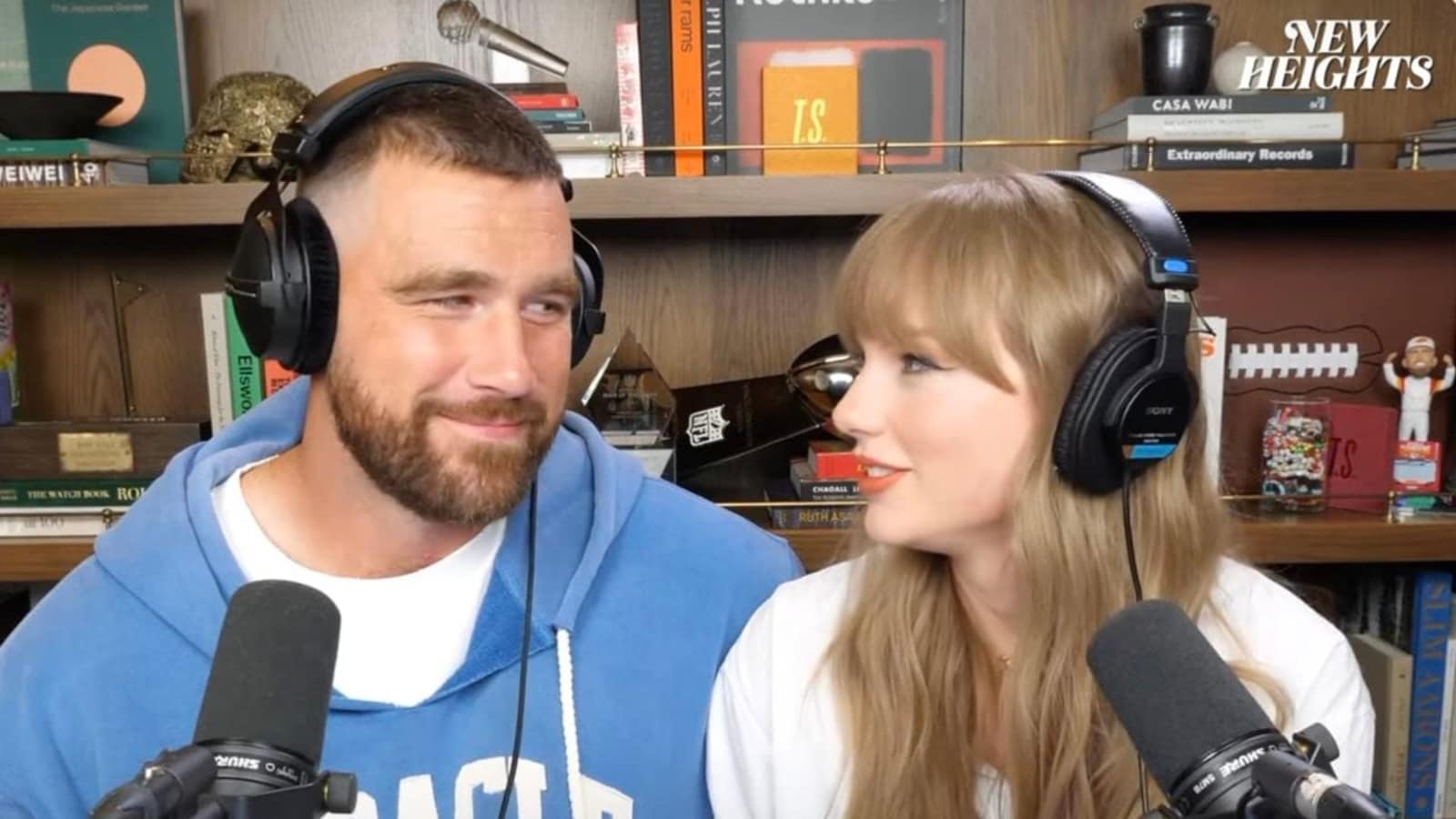 Taylor Swift, Travis Kelce share rare kiss on New Heights podcast