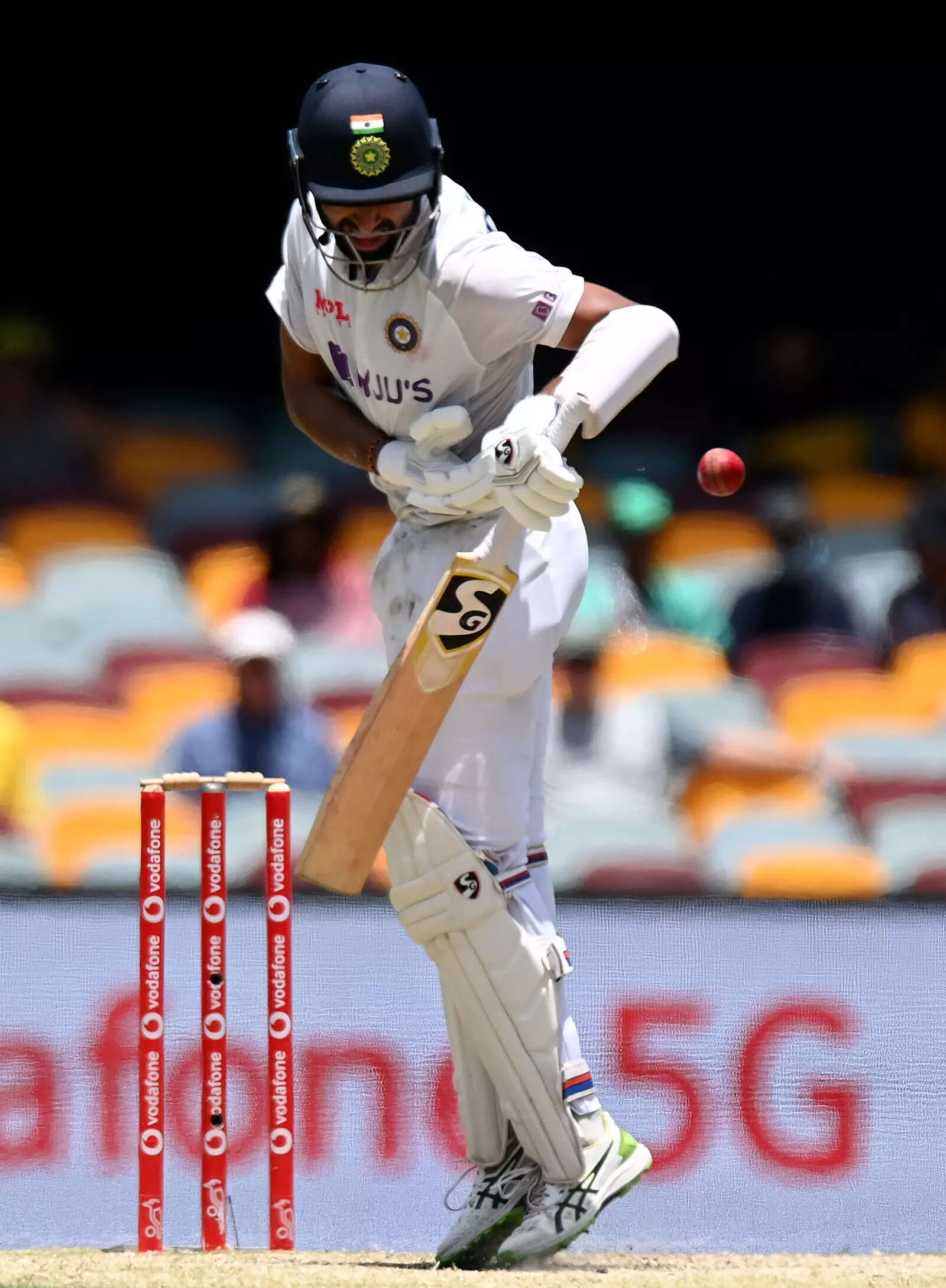 Cheteshwar Pujara is struck by the ball during day five of the 4th Test Match in the series between Australia and India at The Gabba on January 19, 2021 in Brisbane, Australia. (Photo by Bradley Kanaris/Getty Images) Australia v India: 4th Test: Day 5