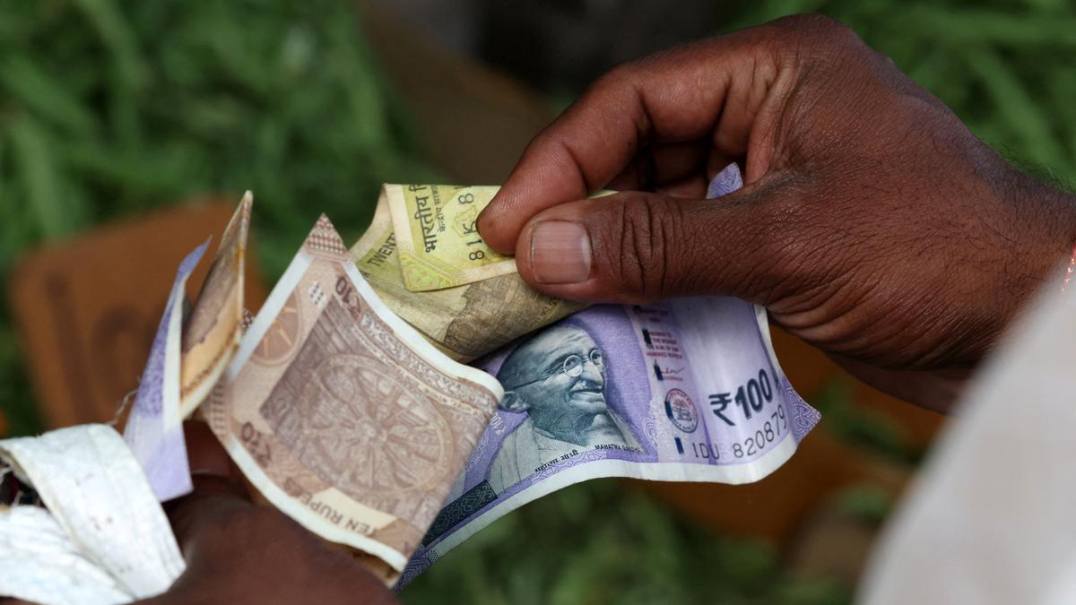 Rupee declines 27 paise to close at 87.52 against U.S. dollar