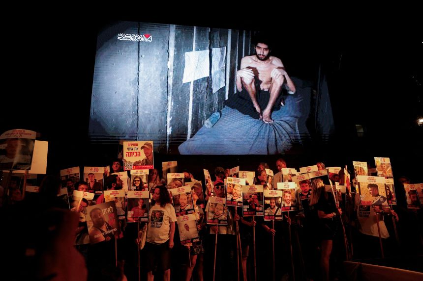 A video released by Hamas of hostage Evyatar David is displayed at a protest in Tel Aviv, Israel, August 2, 2025. 