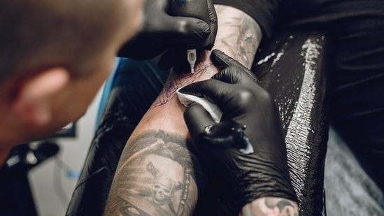 While many tattoo studios follow strict hygiene protocols, there are many unregulated or informal parlours that do cut corners. (Freepik) While many tattoo studios follow strict hygiene protocols, there are many unregulated or informal parlours that do cut corners. (Freepik)