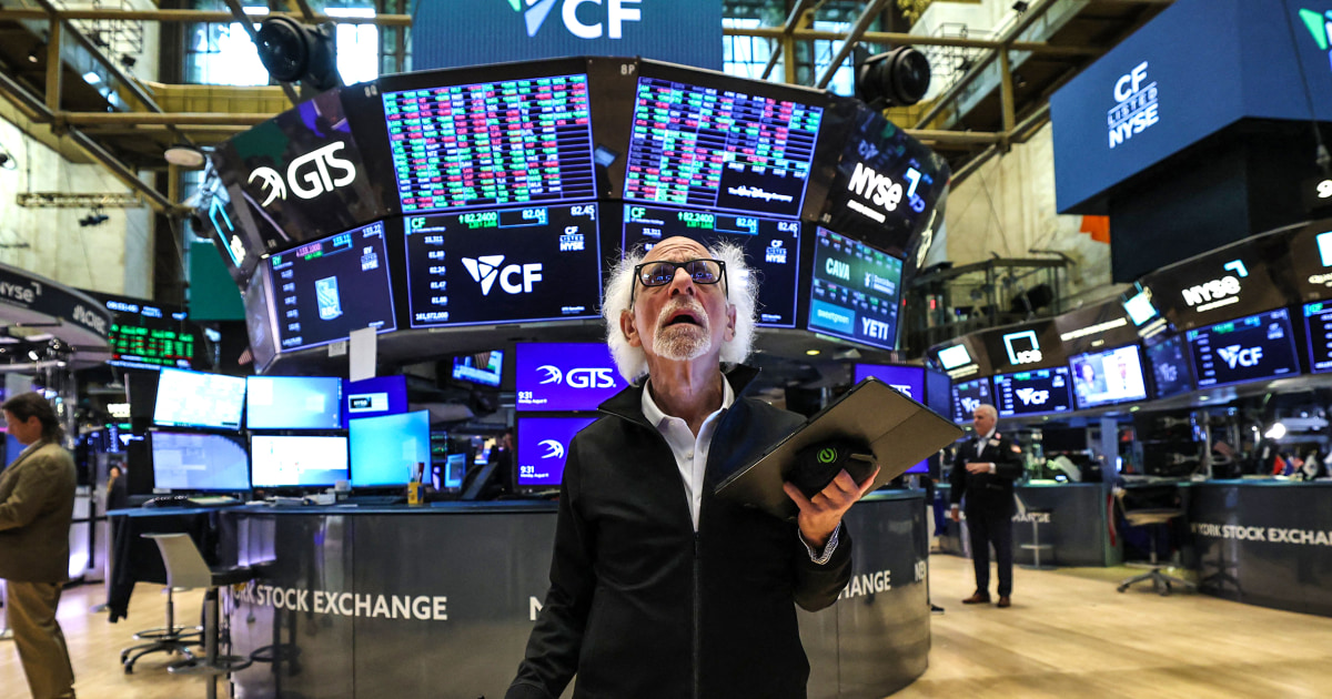 Wall Street stocks end down, inflation data, China trade in focus