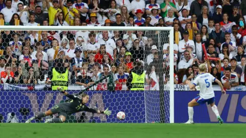 REUTERS/Matthew Childs Alex Greenwood scoring in the penalty shootout