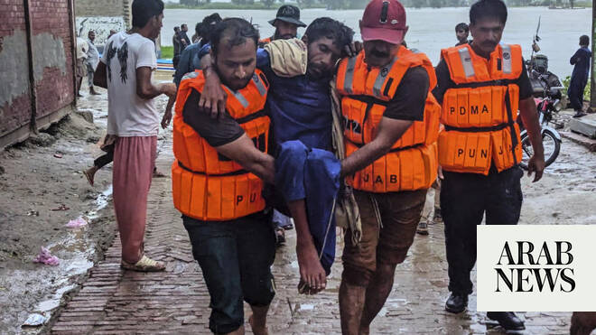 Pakistan evacuates thousands as India releases water from overflowing dams, swollen rivers
