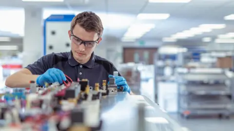 Getty Images Engineer working in factory - stock shot