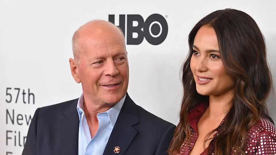 US actor Bruce Willis (L) and wife Emma Heming Willis attend the premiere of