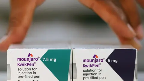 Two boxes containing differing dose pens of Mounjaro next to one another