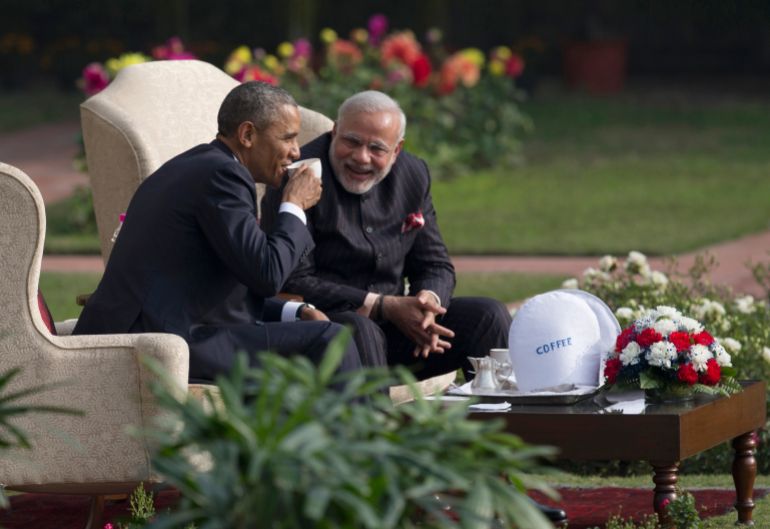 FILE - In this Sunday, Jan. 25, 2015 file photo, President Barack Obama, left, and Indian Prime Minister Narendra Modi have coffee and tea in the gardens of the Hyderabad House in New Delhi, India. As Barack Obama embarks on what is likely to be his final trip to Asia as president, attention is returning to what is known as the U.S. "pivot" to the continent launched during his first term. The policy adjustment aimed to reinforce alliances and shift military assets to a region that has grown in importance alongside the rise of China as a global economic and political power. (AP Photo/Carolyn Kaster, File)
