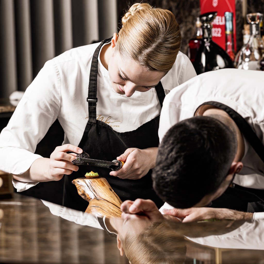 Chefs Gabriela Filca and Saša Janović in the kitchen at Nebo Restaurant & Lounge