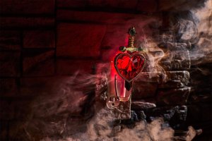A heart-shaped sword air freshner from the Evil Queen fragrance set. (Credit: Bath and Body Works)