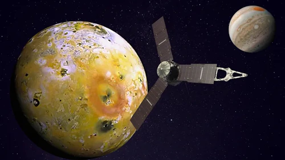 An illustration shows NASA's Juno spacecraft near Io with its parent planet Jupiter in the background (Credit : NASA)