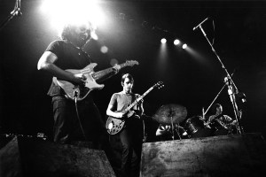 (L-R) Jerry Garcia, Bob Weir and Bill Kreutzmann of The Grateful Dead perform on stage at the Tivoli Concert Hall in April 1972 in Copenhagen, Denmark. (Photo by Gijsbert Hanekroot/Redferns)