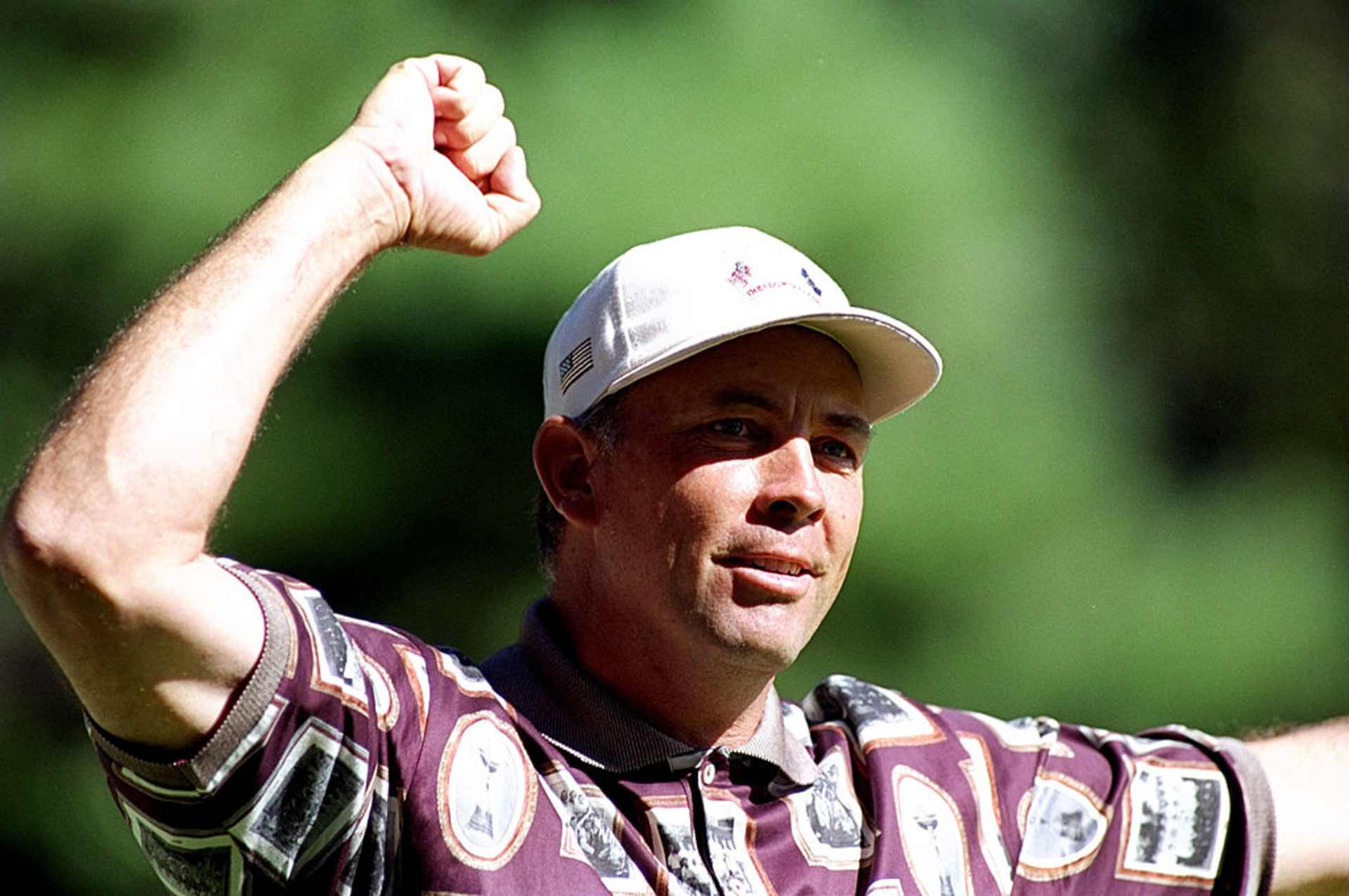 26 Sep 1999:  Tom Lehman of the USA celebrates as team mate David Duval wins his match during the 33rd Ryder Cup at Brookline Country Club, Boston, Massachusetts, USA.  Mandatory Credit: Craig Jones /Allsport