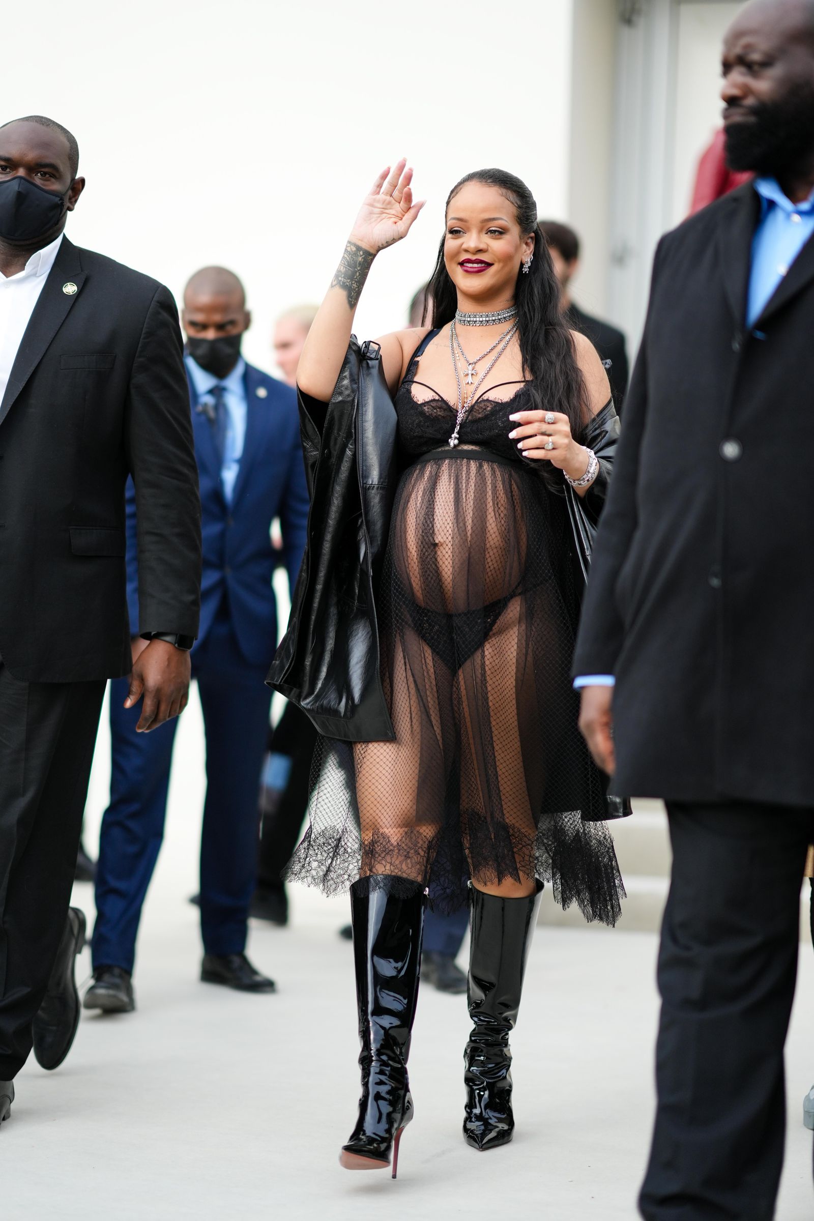 Image may contain Rihanna Adult Person Clothing Footwear Shoe Coat Jacket Accessories Jewelry and Necklace