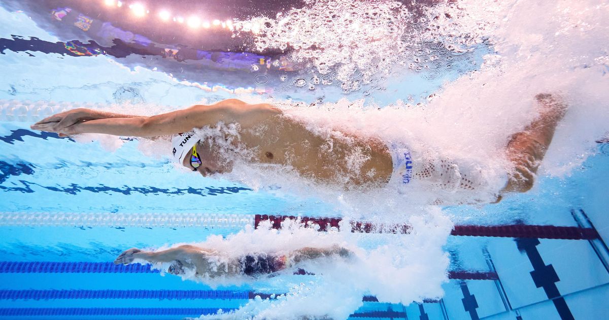 Athletes talk before the World Junior Swimming Championships