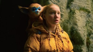 THE LEGEND OF OCHI, Helena Zengel, with Ochi, 2025. © A24 /Courtesy Everett Collection