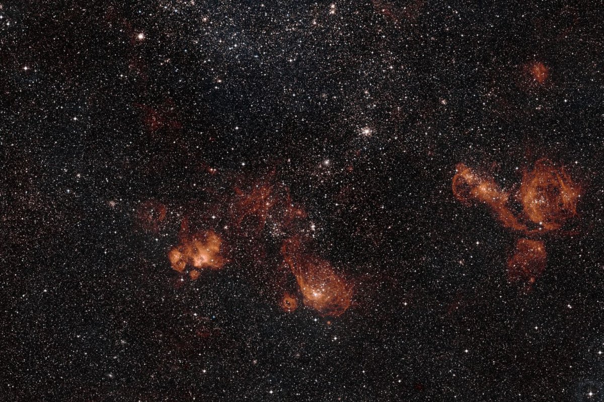 NASA astronaut shares surreal photo of Earth, 3 galaxies