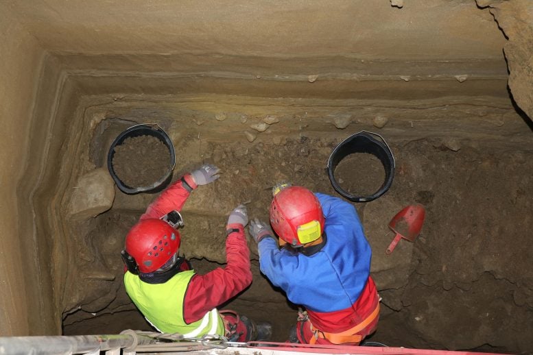 Two Reseachers Excavating Arne Qvamgrotta