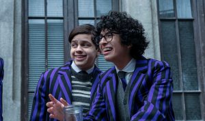 L to R: Isaac Ordonez as Pugsley Addams and Moosa Mostafa as Eugene in 'Wednesday' Season 2 Part 1