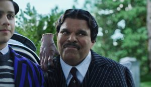 L to R: Isaac Ordonez as Pugsley Addams, Thing, Luis Guzmán as Gomez Addams in 'Wednesday' Season 2 Part 1