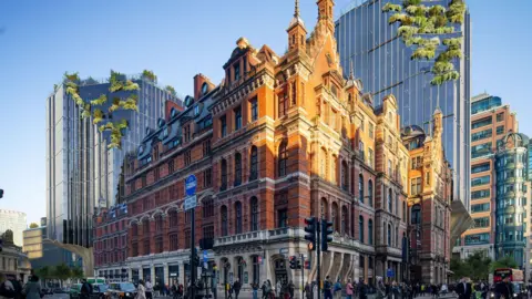 Network Rail / Acme Liverpool Street station, a large, red brick, Victorian building, with glass fronted skyscrapers in the background