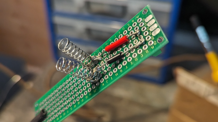 Compliant Contacts: Hacking Door Locks With Pen Springs