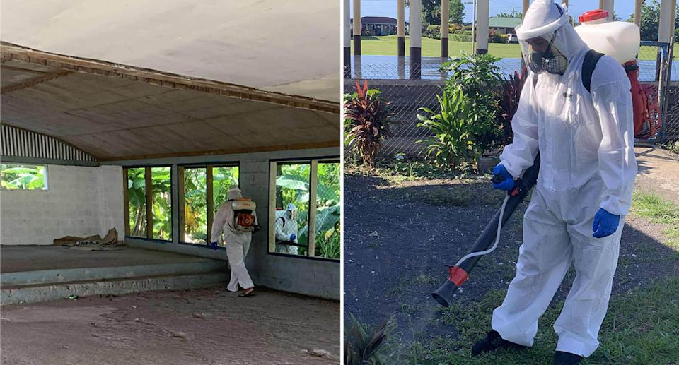 Men dressed in white PPE spray gardens and building in Samoa for mosquitoes amid a spike in dengue cases.