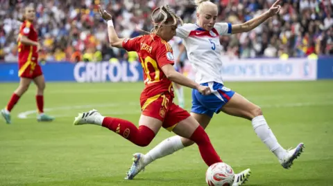 GEORGIOS KEFALAS/EPA/Shutterstock Alex Greenwood in action against Spain's Athenea Del Castillo during the UEFA Women's EURO 2025 final
