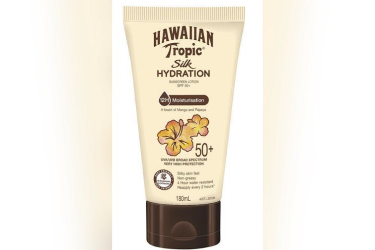 A bottle of Hawaiian Tropic sunscreen.