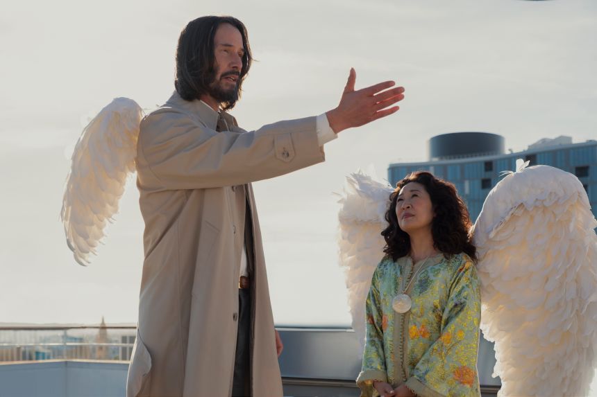 Keanu Reeves and Sandra Oh in
