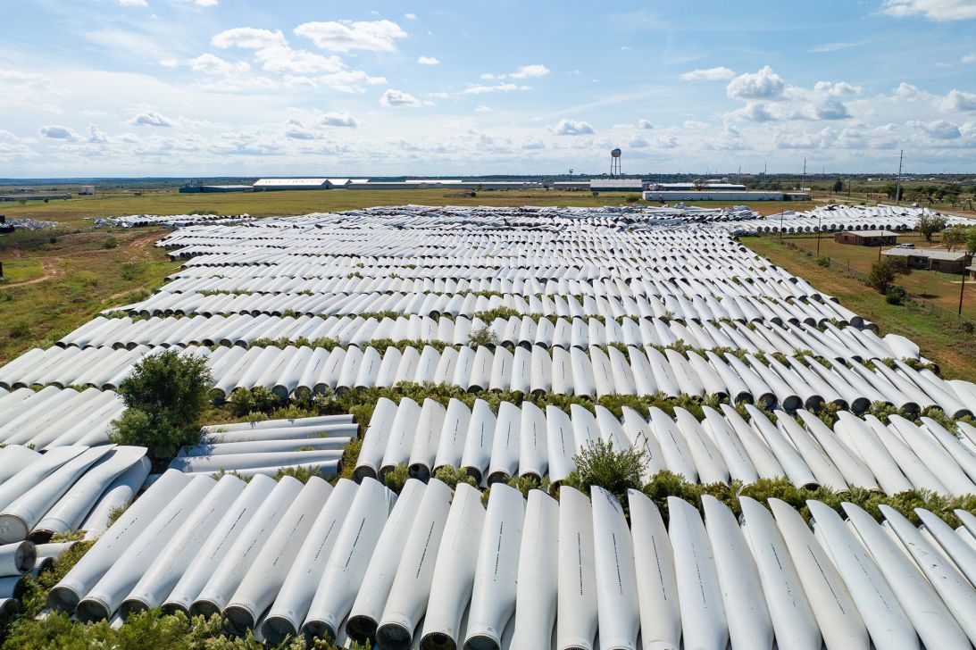 Discarded wind turbine blades are seen in a field in Sweetwater, Texas in 2023.