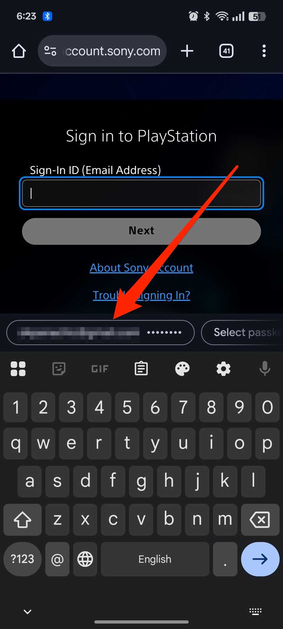 PlayStation sign-in webpage with Gboard open and showing Autofill suggestion