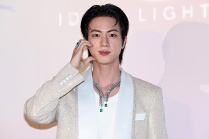 SEOUL, SOUTH KOREA - MARCH 13: Fred brand global ambassador, Jin, jewelry detail, of boy band BTS attends the photocall for the FRED "Monsieur Fred Ideal Light" collection at Josun Palace on March 13, 2025 in Seoul, South Korea. (Photo by Han Myung-Gu/WireImage)