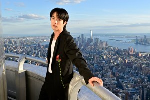 NEW YORK, NEW YORK - MAY 20: BTS' Jin lights the Empire State Building in celebration of his second solo album, Echo, on May 20, 2025 in New York City. (Photo by Eugene Gologursky/Getty Images for Empire State Realty Trust)