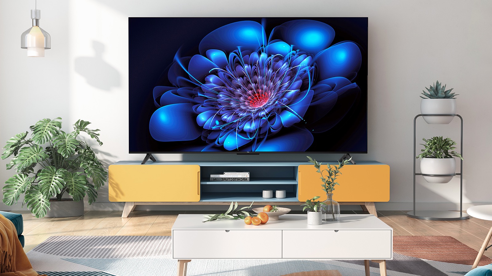 A TCL P6K TV on a TV cabinet behind a coffee table in a modern lounge.