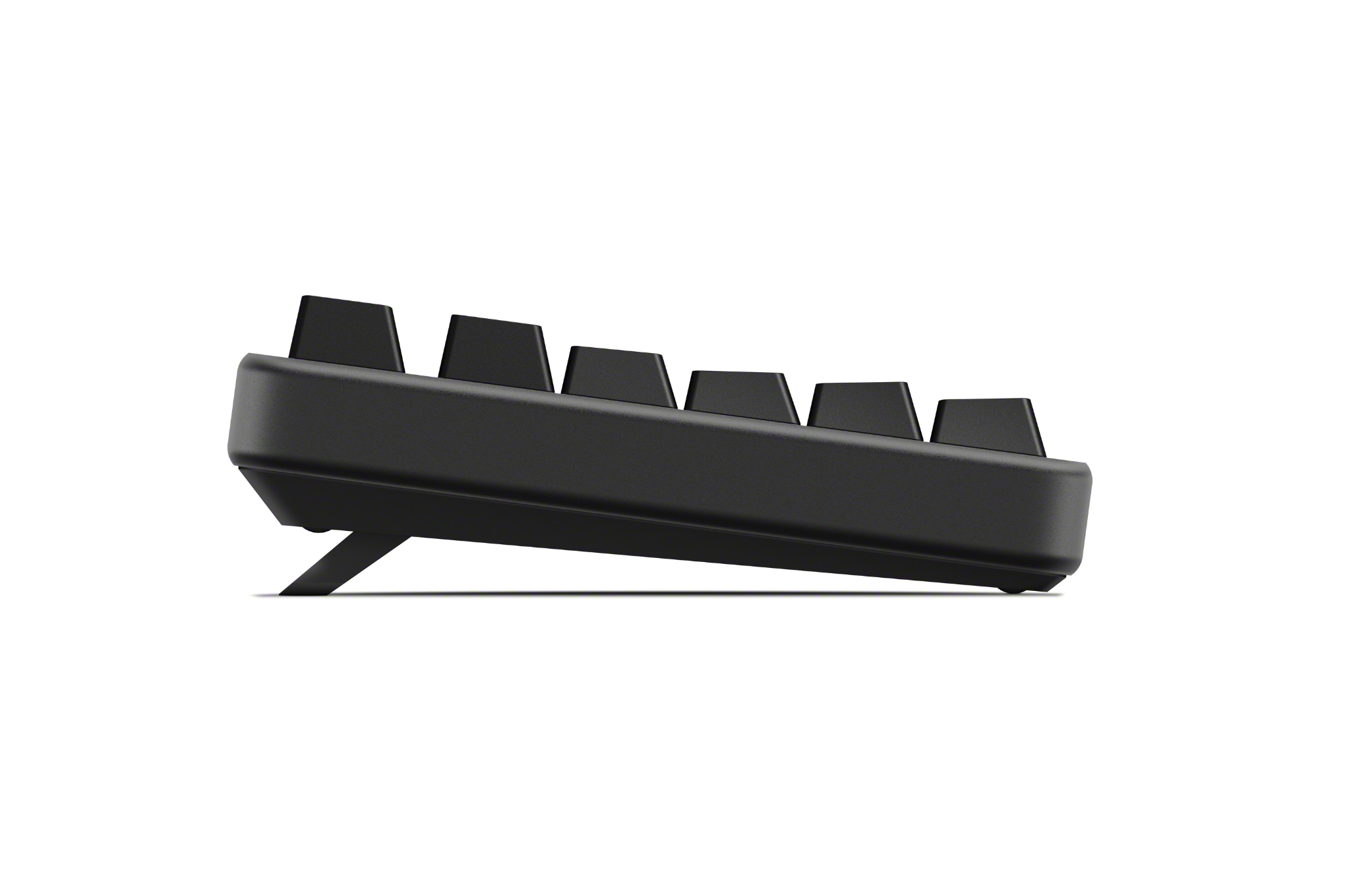 An image showing the aluminum-milled side of the InZone wired gaming keyboard. Its cascaded keys are viewable, as are its flip-out feet.