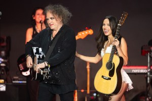 GLASTONBURY, ENGLAND - JUNE 29: Olivia Rodrigo performs with Robert Smith of The Cure on the Pyramid stage during day five of Glastonbury festival 2025 at Worthy Farm, Pilton on June 29, 2025 in Glastonbury, England. Established by Michael Eavis in 1970, Glastonbury has grown into the UK's largest music festival, drawing over 200,000 fans to enjoy performances across more than 100 stages. In 2026, the festival will take a fallow year, a planned pause to allow the Worthy Farm site time to rest and recover. (Photo by Samir Hussein/WireImage)