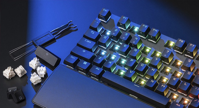 A full-size keyboard with some of the keycaps and switches removed
