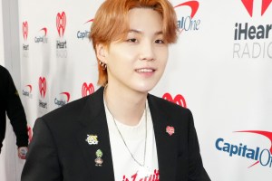INGLEWOOD, CALIFORNIA - DECEMBER 03: (EDITORIAL USE ONLY) Suga of BTS attends iHeartRadio 102.7 KIIS FM's Jingle Ball 2021 presented by Capital One at The Forum on December 03, 2021 in Los Angeles, California. (Photo by Jeff Kravitz/Getty Images for iHeartRadio)