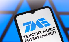In this photo illustration, the Tencent Music Entertainment Group (TME) logo is seen displayed on a smartphone screen.